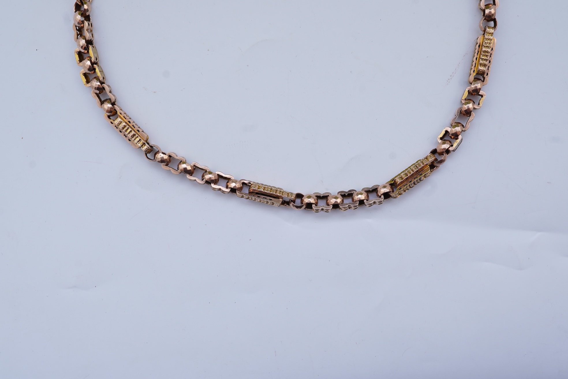 A gold necklace, late 19th century composite